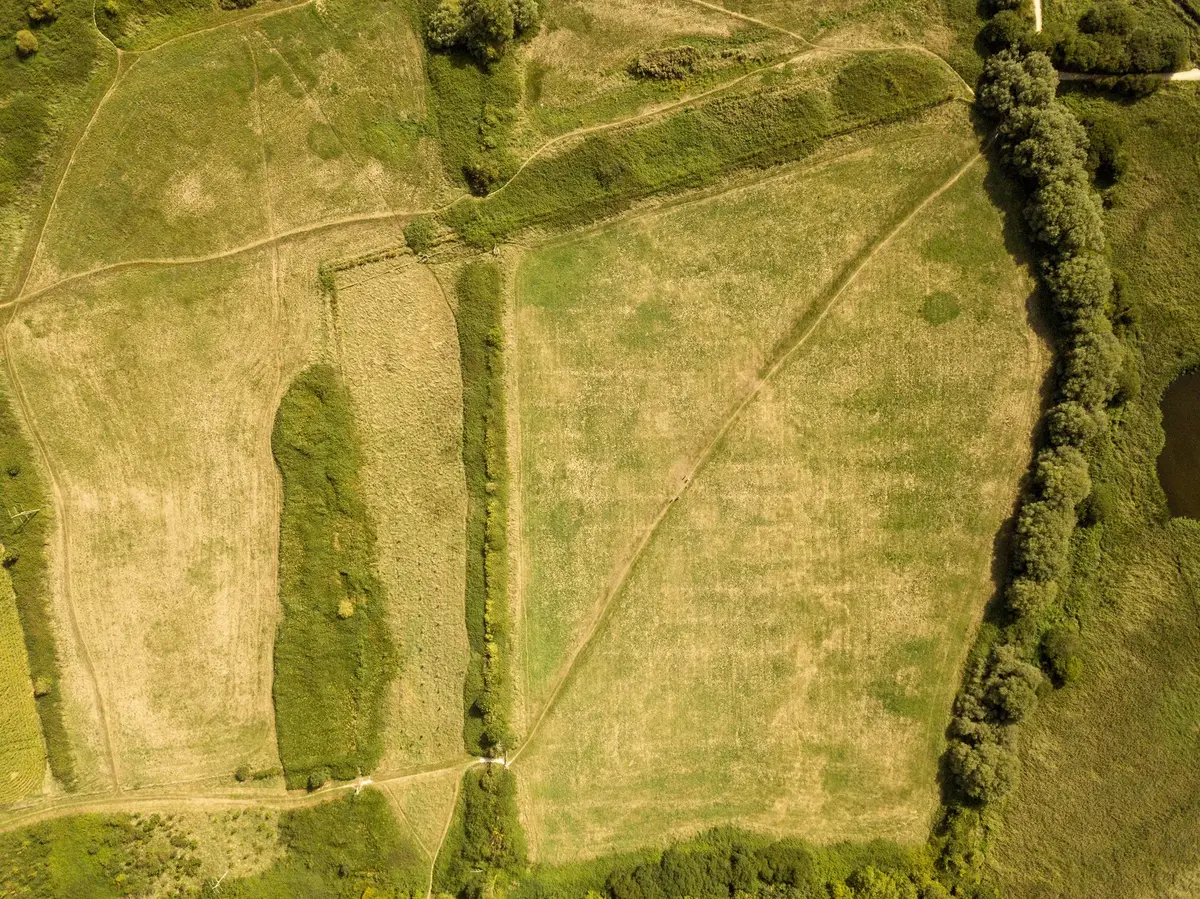 Top-down aerial of land parcels we buy